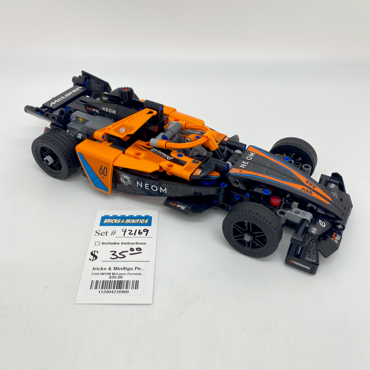 42169 NEOM McLaren Formula E Race Car (U) product image 1, provided for visual reference and product detail review